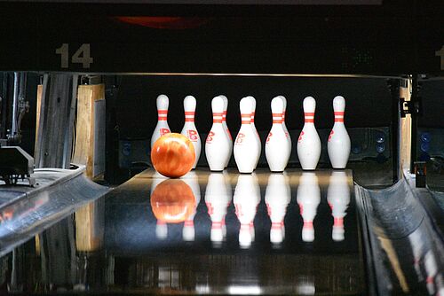 bowling alley with pins and bowling ball