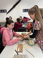 They start to carefully pack their egg