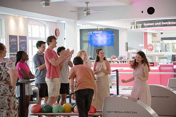 Summer School participants having fun at the bowling event.