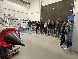 The students from the Swedish delegation gain insights into engine technology