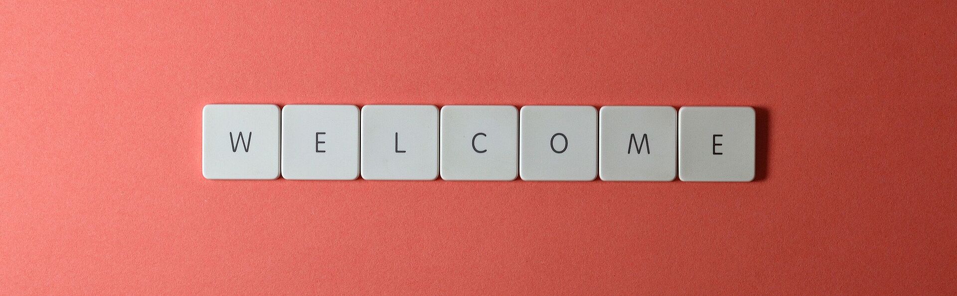 Scrabble-Steine mit Welcome