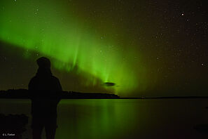 Polarlichter am finnischen Nachthimmel.