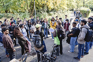 A large group of students during a campus tour.