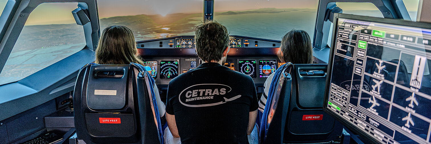 Menschen im Flugzeug-Cockpit 