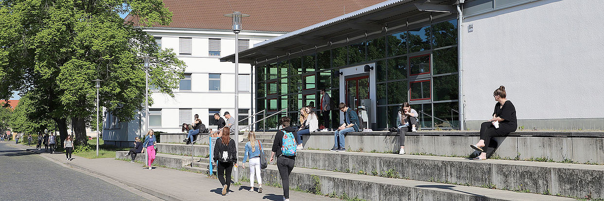 Students in front of the auditorium building on North Campus 