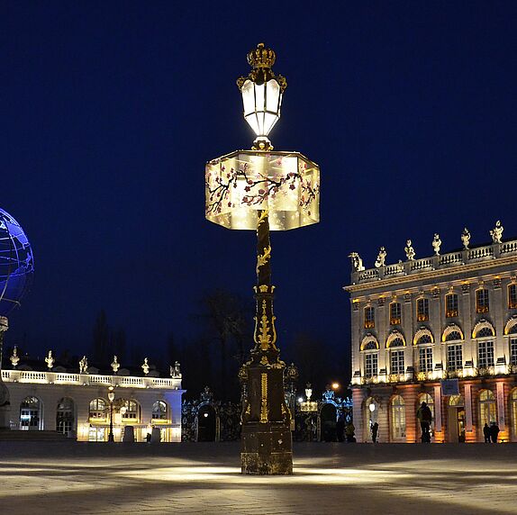 Street lamps and architecture in Nancy, France, at night
