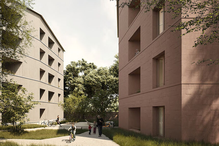 Zwei Neubauten, eines in Holz-Lehm- und das zweite in Ziegel-Holz-Bauweise, sollen die Potenziale des nachhaltigen Bauens im öffentlichen Mietwohnungsbau aufzeigen.