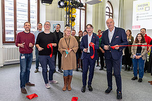The red ribbon is being cut and the Media Lab is officially open!