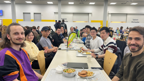 International Students having lunch at the chinese lunch break