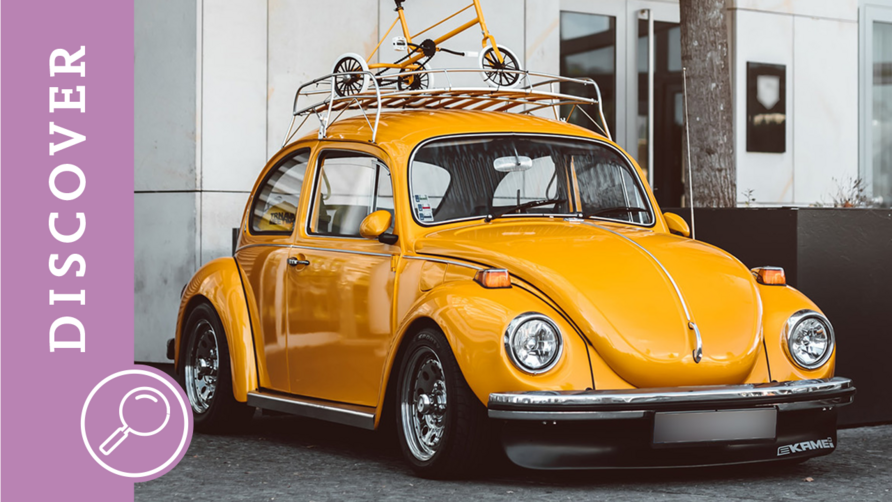 ein gelber VW Käfer